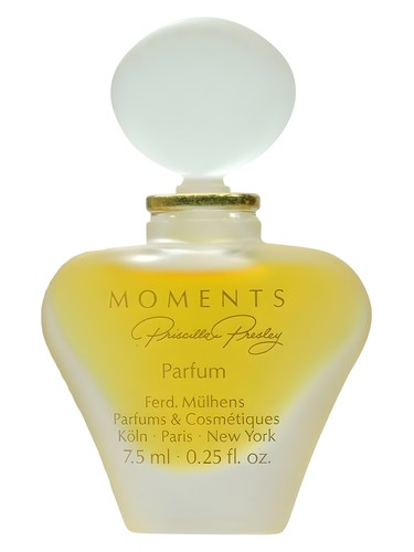 Frasco de Moments Parfum, de Priscilla Presley